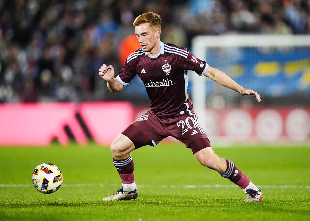 Nov 1, 2024; Commerce City, Colorado, USA; Colorado Rapids midfielder Connor Ronan (20) dribbles the ball during the first half against the LA Galaxy in a 2024 MLS Cup Playoffs Round One match at Dick's Sporting Goods Park. Mandatory Credit: Ron Chenoy-Imagn Images