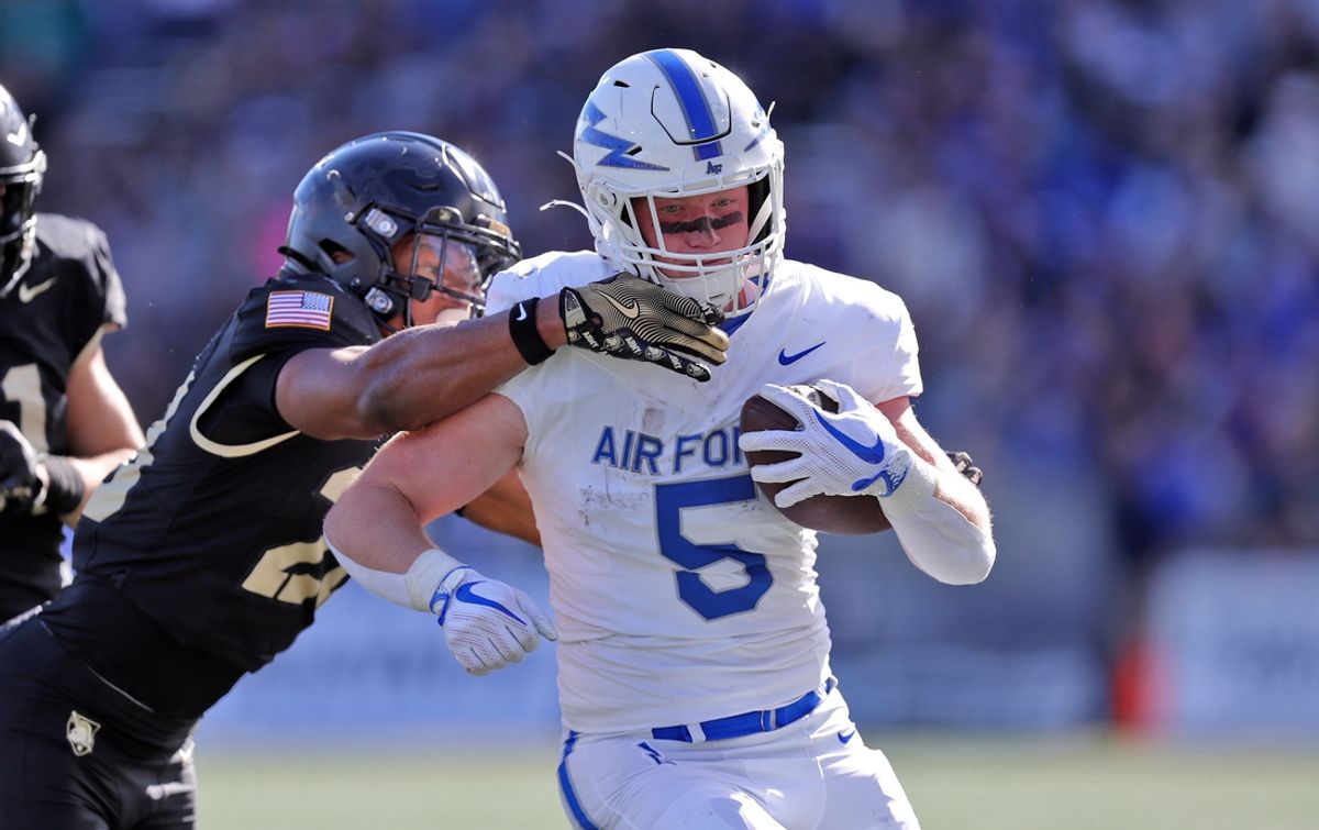 Nov 2, 2024; West Point, New York, USA; Air Force Falcons running back Dylan Carson (5) runs with the ball against the Army Black Knights during the first half at Michie Stadium. Mandatory Credit: Danny Wild-Imagn Images