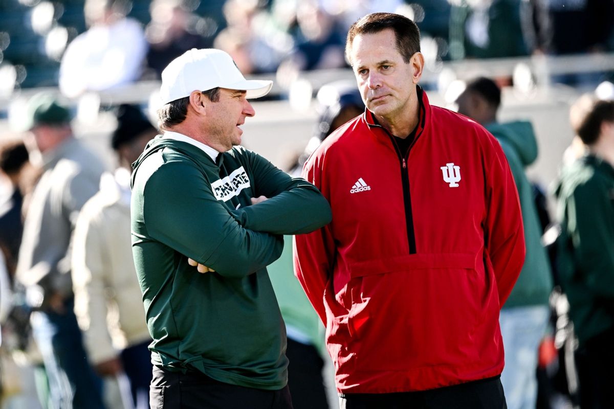 Michigan State's head coach Jonathan Smith, left, talks with Indiana's head coach Curt Cignetti before the game on Saturday, Nov. 2, 2024, at Spartan Stadium in East Lansing.