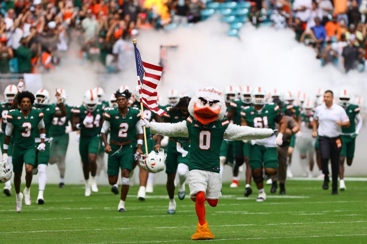 Nov 2, 2024; Miami Gardens, Florida, USA; Miami Hurricanes mascot Sebastian the Ibis leads the team onto the field before the game against the Duke Blue Devils at Hard Rock Stadium. Mandatory Credit: Sam Navarro-Imagn Images