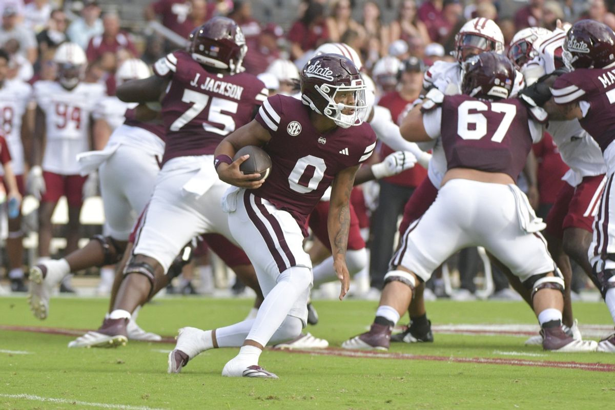 Nov 2, 2024; Starkville, Mississippi, USA; Mississippi State Bulldogs quarterback Michael Van Buren Jr. (0) runs the ball against the Massachusetts Minutemen during the first quarter at Davis Wade Stadium at Scott Field. Mandatory Credit: Matt Bush-Imagn Images