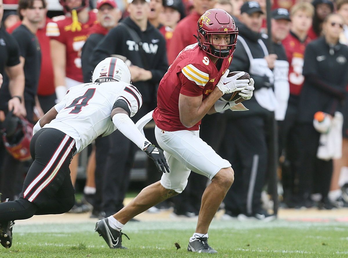 Iowa State Cyclones wide receiver Jayden Higgins (9) makes a catch around Texas Tech Red Raiders' defensive back Maurion Horn (4) during the second quarter in the week-10 NCAA football at Jack Trice Stadium on Saturday, Nov. 2, 2024, in Ames, Iowa.