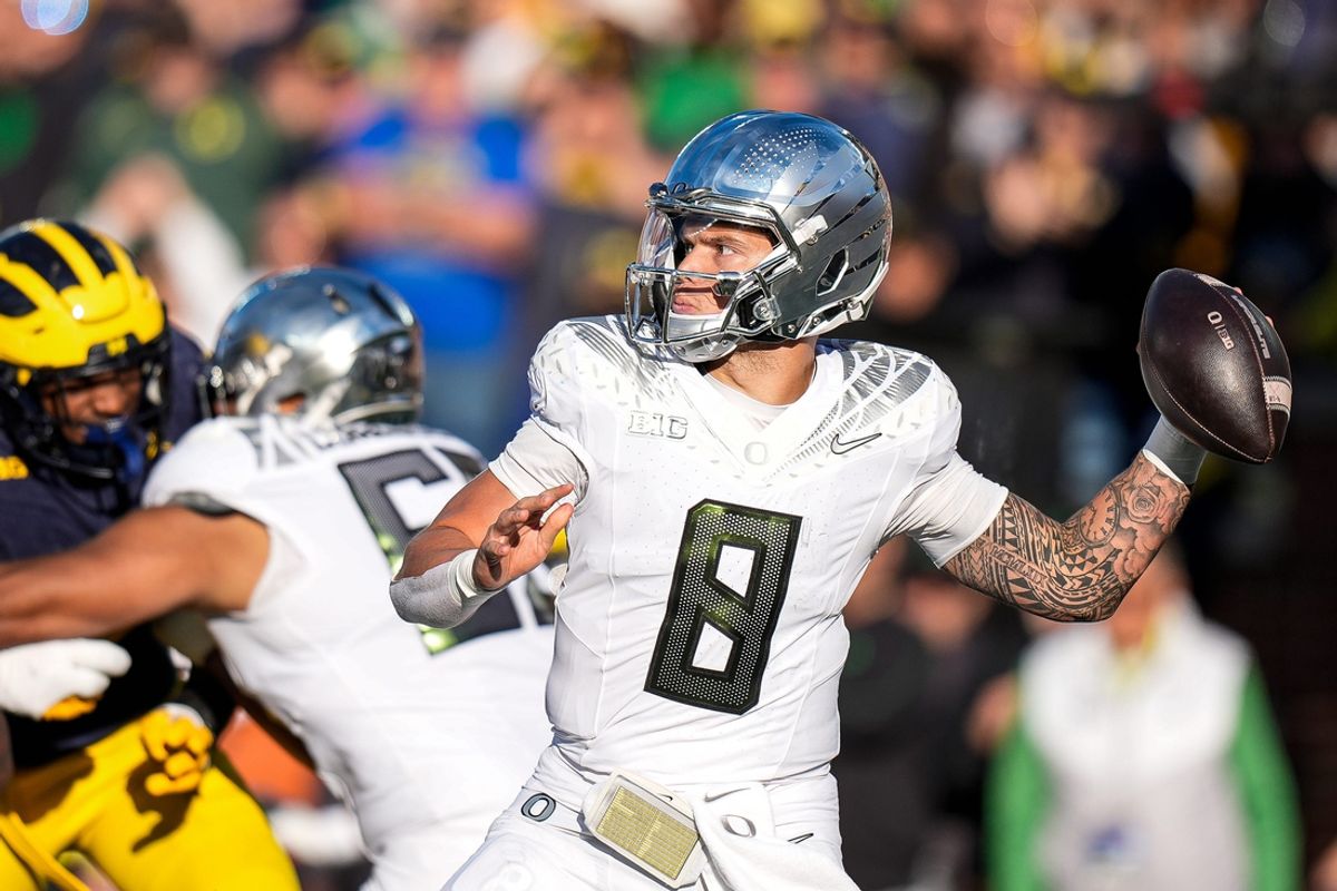 Oregon quarterback Dillon Gabriel (8) makes a pass against Michigan during the first half at Michigan Stadium in Ann Arbor on Saturday, Nov. 2, 2024.