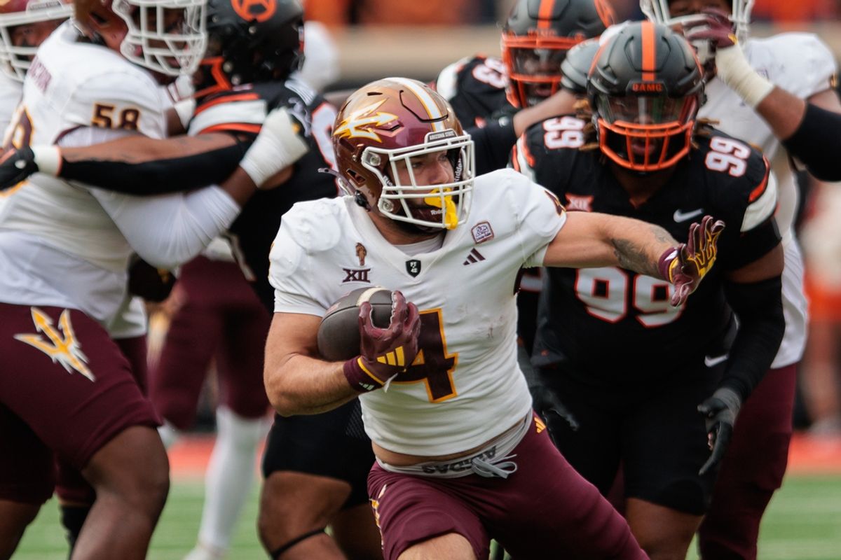 Nov 2, 2024; Stillwater, Oklahoma, USA; Arizona State Sun Devils running back Cam Skattebo (4) runs the ball during the first quarter against the Oklahoma State Cowboys at Boone Pickens Stadium. Mandatory Credit: William Purnell-Imagn Images