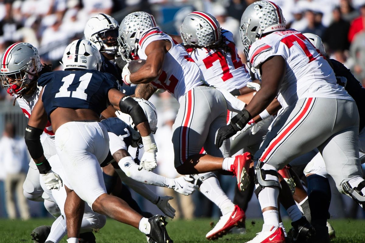 Ohio State running back TreVeyon Henderson carries the ball late in the fourth quarter of an NCAA football game against Penn State, Saturday, Nov. 2, 2024, in State College, Pa.