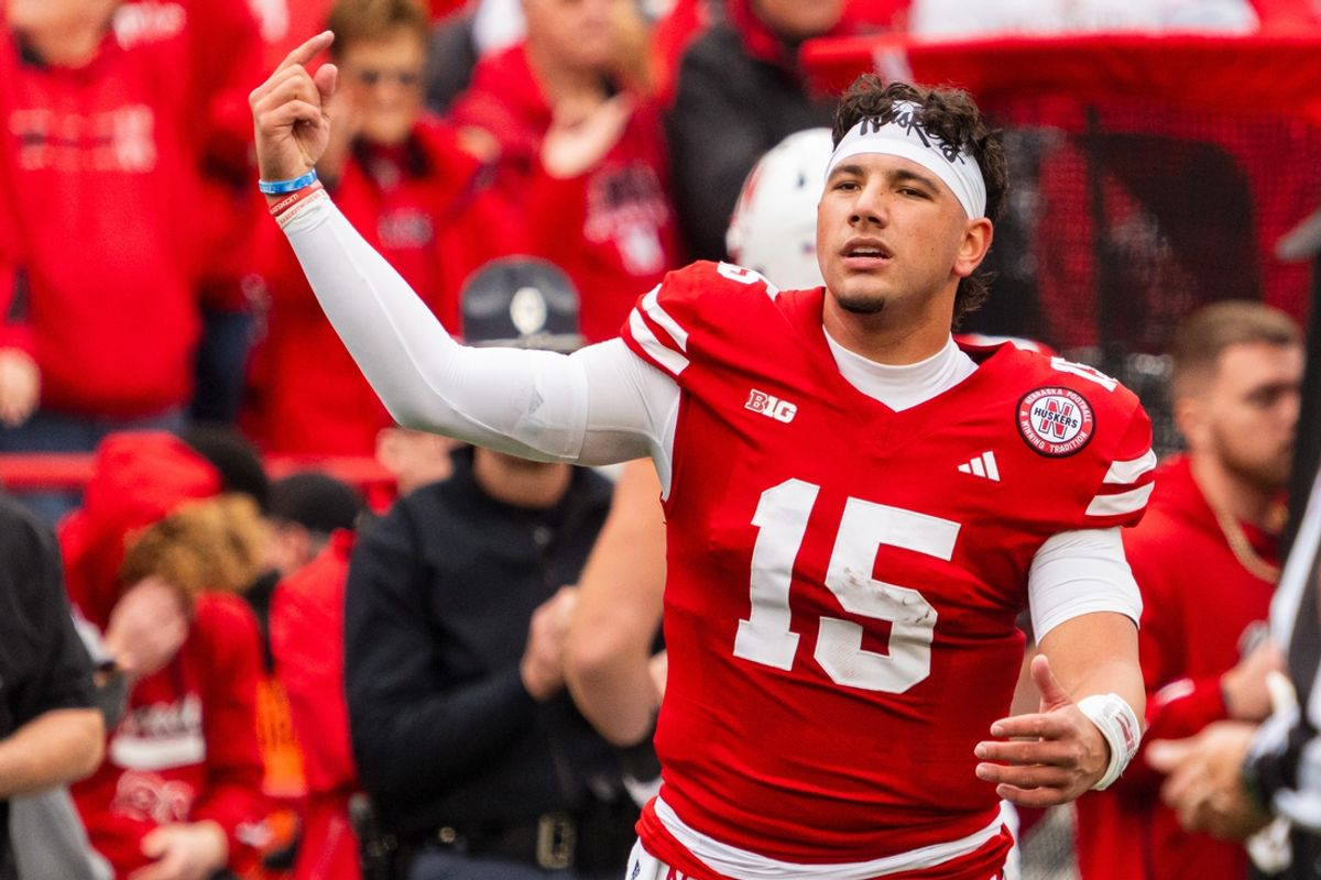 Nov 2, 2024; Lincoln, Nebraska, USA; Nebraska Cornhuskers quarterback Dylan Raiola (15) celebrates after a touchdown against the UCLA Bruins during the second quarter at Memorial Stadium. Mandatory Credit: Dylan Widger-Imagn Images
