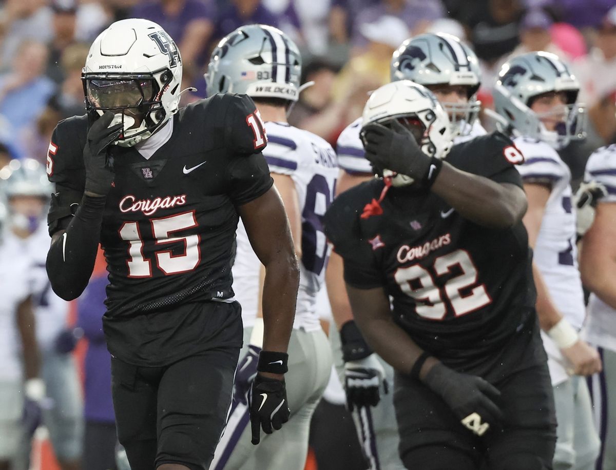 Nov 2, 2024; Houston, Texas, USA; Houston Cougars defensive back Hershey McLaurin (15) reacts after tackling Kansas State Wildcats running back DJ Giddens (31) for a loss in the first quarter at TDECU Stadium. Mandatory Credit: Thomas B. Shea-Imagn Images