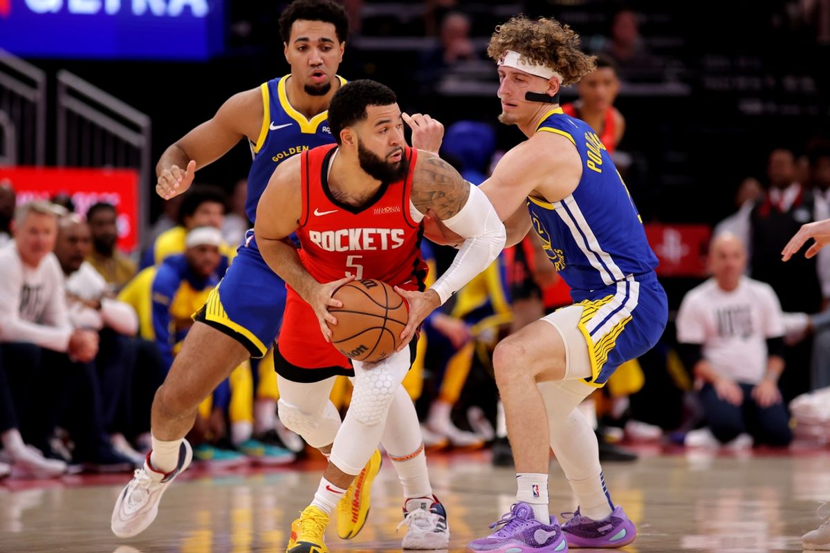 Nov 2, 2024; Houston, Texas, USA; Houston Rockets guard Fred VanVleet (5) handles the ball against Golden State Warriors guard Brandin Podziemski (2) during the first quarter at Toyota Center. Mandatory Credit: Erik Williams-Imagn Images