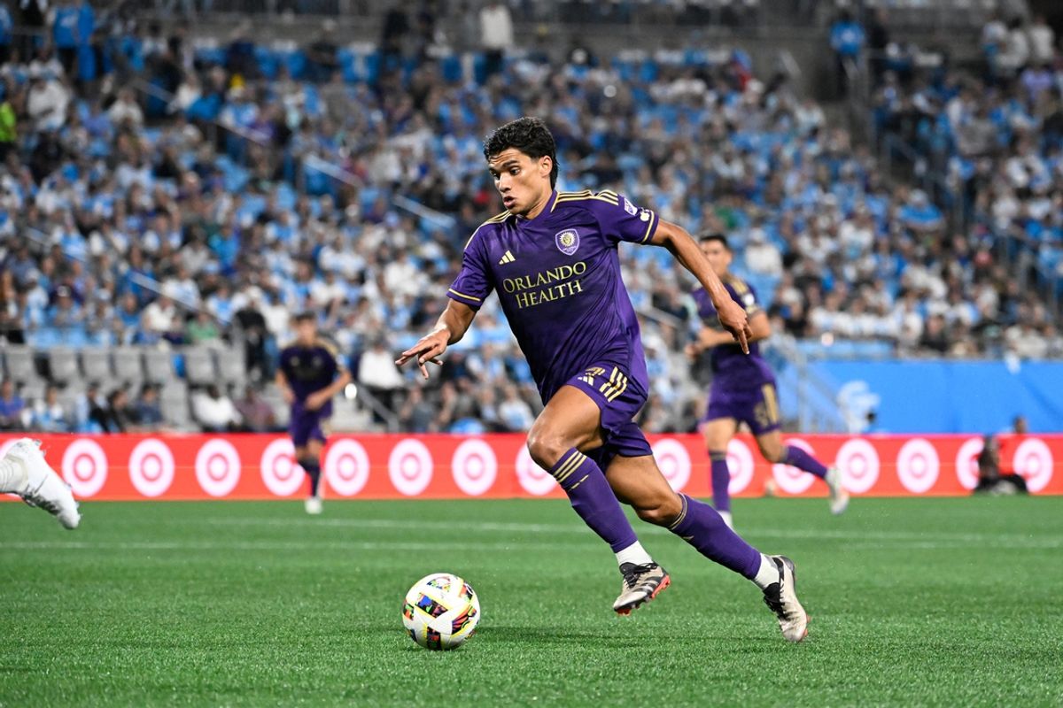 Nov 1, 2024; Charlotte, North Carolina, USA; Orlando City forward Ramiro Enrique (7) with the ball in the second half at Bank of America Stadium. Mandatory Credit: Bob Donnan-Imagn Images