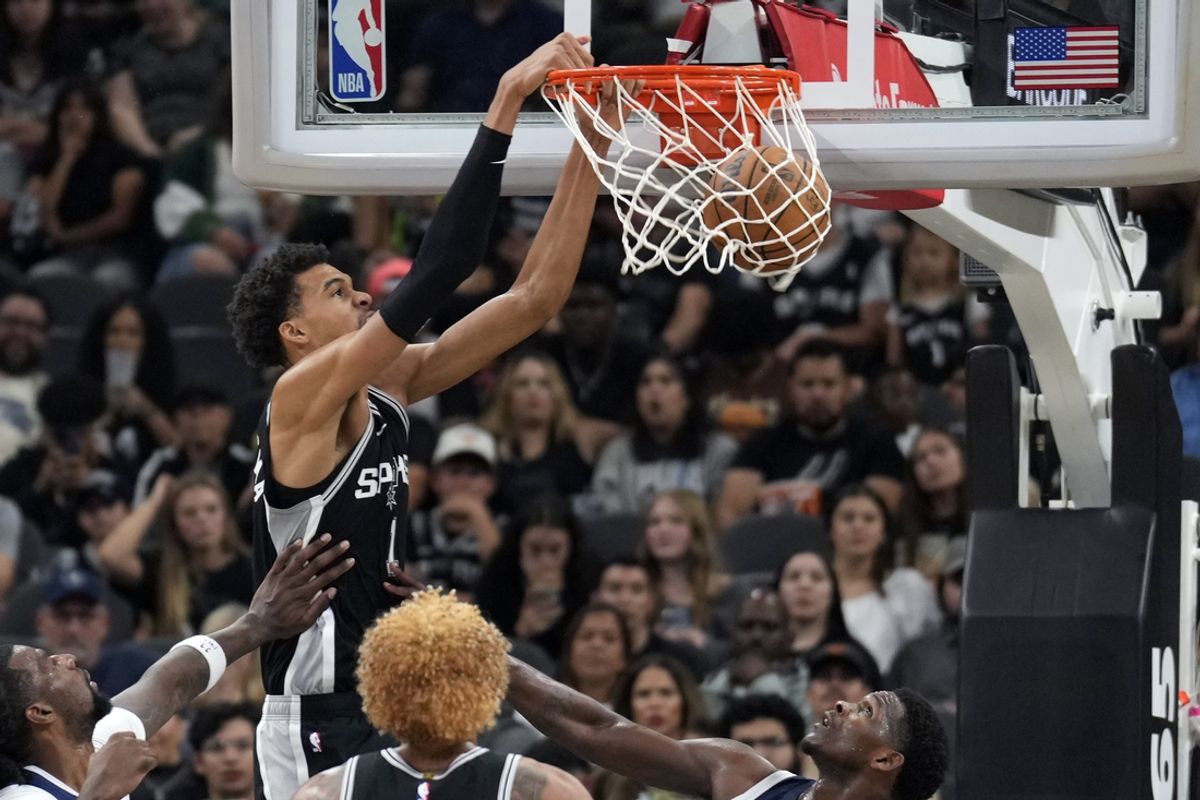 Nov 2, 2024; San Antonio, Texas, USA; San Antonio Spurs center Victor Wembanyama (1) dunks during the first half against the Minnesota Timberwolves at Frost Bank Center. Mandatory Credit: Scott Wachter-Imagn Images