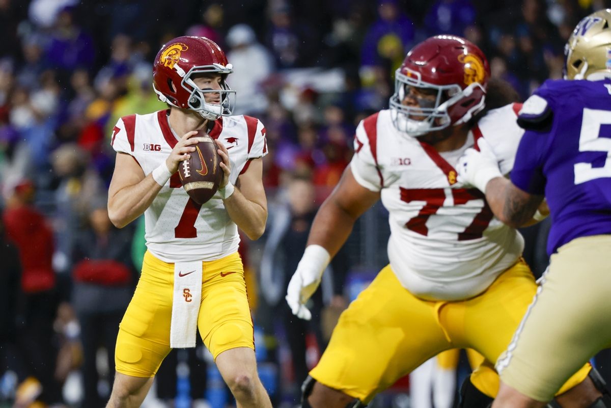 Nov 2, 2024; Seattle, Washington, USA; USC Trojans quarterback Miller Moss (7) looks to pass against the Washington Huskies during the second quarter at Alaska Airlines Field at Husky Stadium. Mandatory Credit: Joe Nicholson-Imagn Images