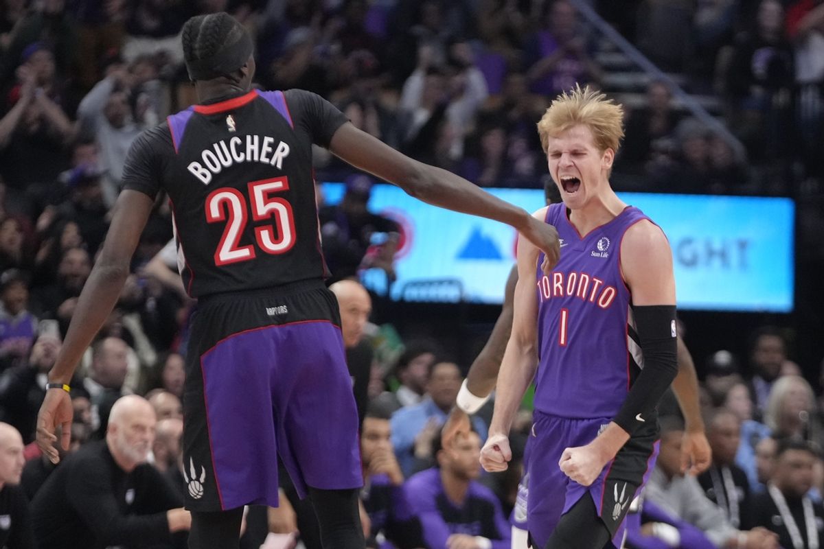 Nov 2, 2024; Toronto, Ontario, CAN; Toronto Raptors guard Gradey Dick (1) reacts after a play against the Sacramento Kings during the second half at Scotiabank Arena. Mandatory Credit: John E. Sokolowski-Imagn Images