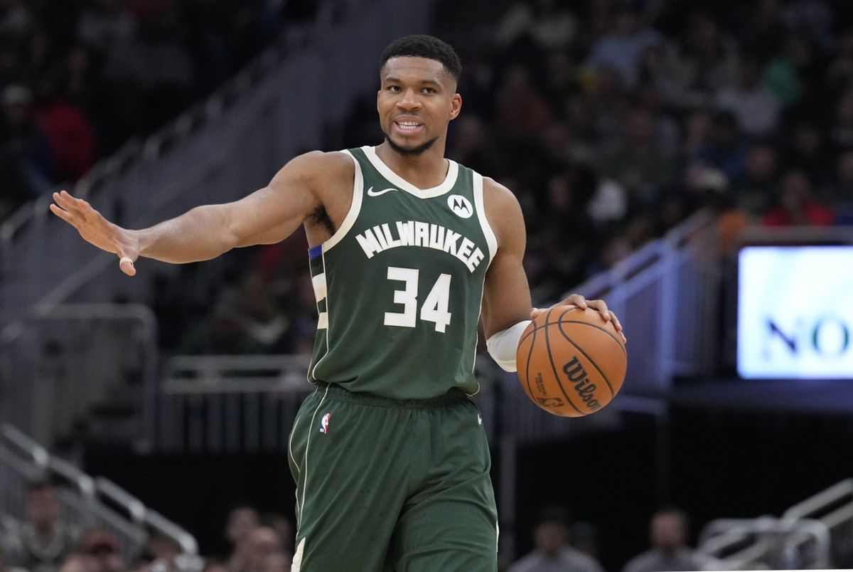 Nov 2, 2024; Milwaukee, Wisconsin, USA; Milwaukee Bucks forward Giannis Antetokounmpo (34) brings the ball up the court against the Cleveland Cavaliers in the second half at Fiserv Forum. Mandatory Credit: Michael McLoone-Imagn Images