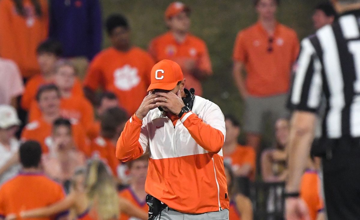 Nov 2, 2024; Clemson, South Carolina, USA; Clemson Tigers head coach Dabo Swinney reacts after people in the stands threw water bottles on the field after a call in favor of the Louisville Cardinals Cardinals during the fourth quarter at Memorial Stadium. Mandatory Credit: Ken Ruinard-Imagn Images