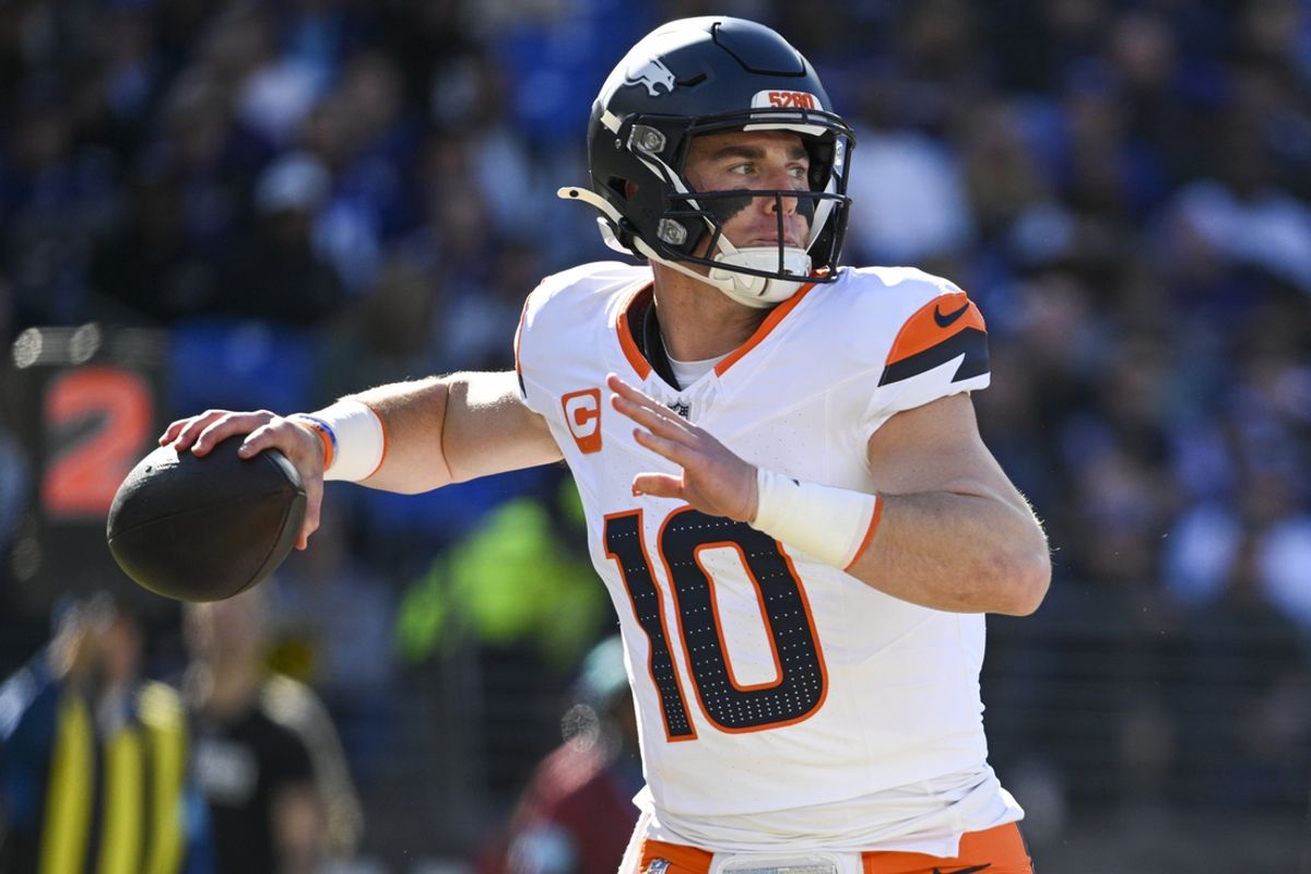 Nov 3, 2024; Baltimore, Maryland, USA;  Denver Broncos quarterback Bo Nix (10) throws during the first quarter against the Baltimore Ravens at M&T Bank Stadium. Mandatory Credit: Tommy Gilligan-Imagn Images