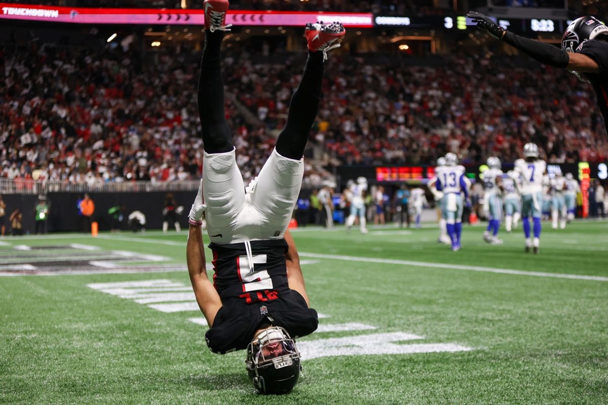 Nov 3, 2024; Atlanta, Georgia, USA; Atlanta Falcons wide receiver Drake London (5) celebrates after a touchdown catch against the Dallas Cowboys in the first quarter at Mercedes-Benz Stadium. Mandatory Credit: Brett Davis-Imagn Images