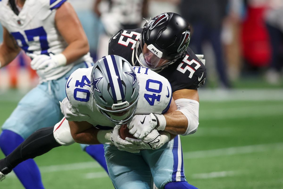 Nov 3, 2024; Atlanta, Georgia, USA; Atlanta Falcons linebacker Kaden Elliss (55) tackles Dallas Cowboys running back Hunter Luepke (40) in the second quarter at Mercedes-Benz Stadium. Mandatory Credit: Brett Davis-Imagn Images