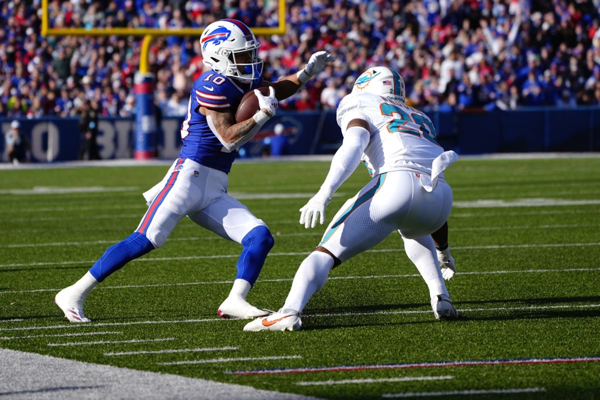 Nov 3, 2024; Orchard Park, New York, USA; Buffalo Bills wide receiver Khalil Shakir (10) runs with the ball against Miami Dolphins linebacker Jordyn Brooks (20) during the first half at Highmark Stadium. Mandatory Credit: Gregory Fisher-Imagn Images