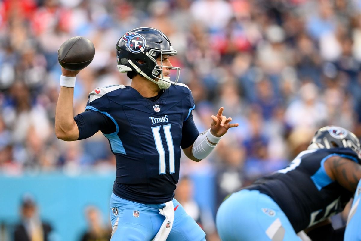 Nov 3, 2024; Nashville, Tennessee, USA;  Tennessee Titans quarterback Mason Rudolph (11) throws the ball against the New England Patriots during the first half at Nissan Stadium. Mandatory Credit: Steve Roberts-Imagn Images