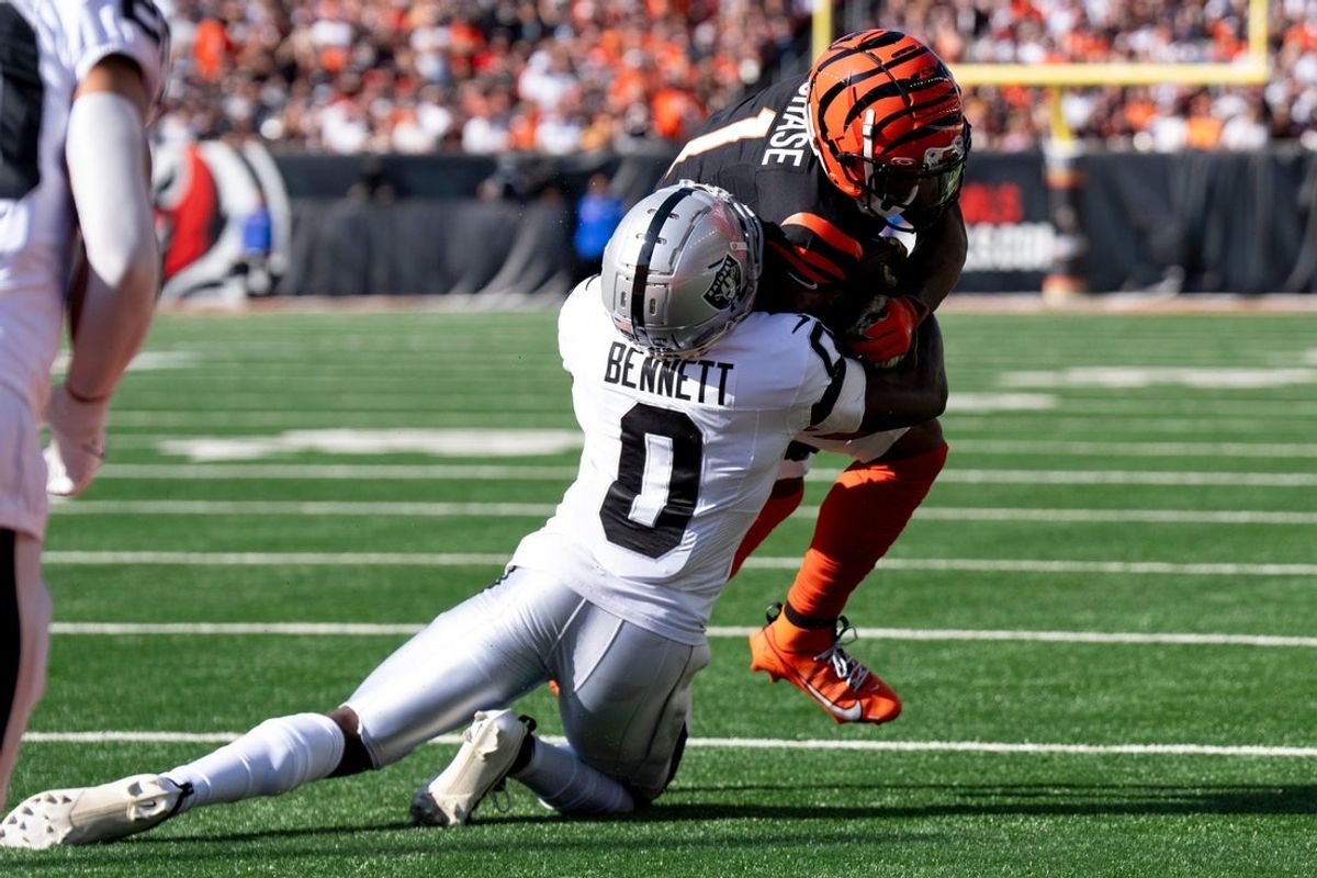 Las Vegas Raiders corner back Jakorian Bennett (0) tackles Cincinnati Bengals wide receiver Ja'Marr Chase (1) at the 1-yard-line in the first quarter of the NFL game at Paycor Stadium in Cincinnati on Sunday, Nov. 3, 2024.