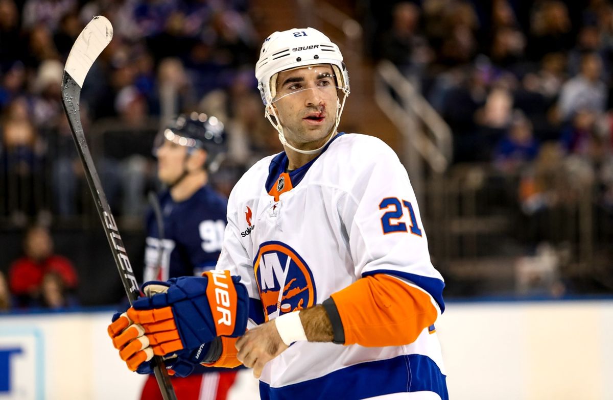 Nov 3, 2024; New York, New York, USA; New York Islanders center Kyle Palmieri (21) is seen with stitches above his lip after sustaining an injury to his face during the second period against the New York Rangers at Madison Square Garden. Mandatory Credit: Danny Wild-Imagn Images