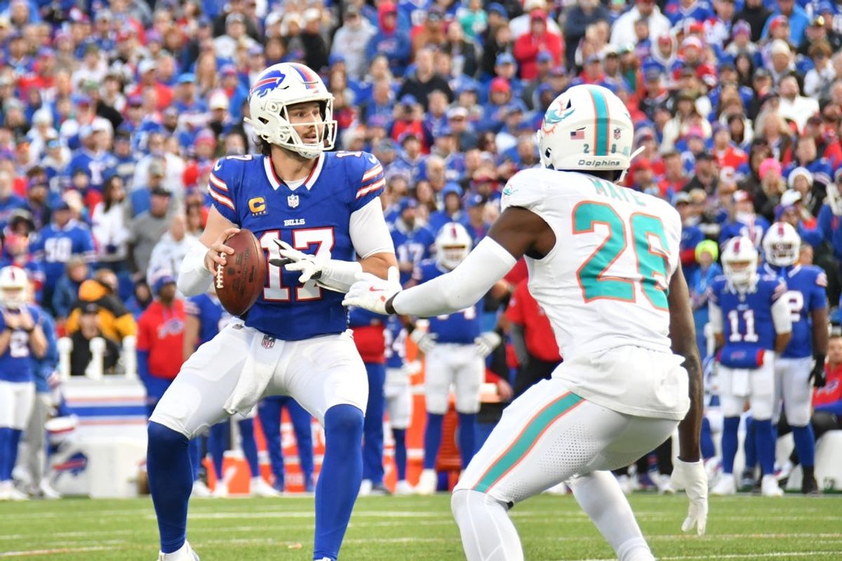 Nov 3, 2024; Orchard Park, New York, USA; Buffalo Bills quarterback Josh Allen (17) looks to throw a pass as Miami Dolphins safety Marcus Maye (26) gives pressure in the fourth quarter at Highmark Stadium. Mandatory Credit: Mark Konezny-Imagn Images