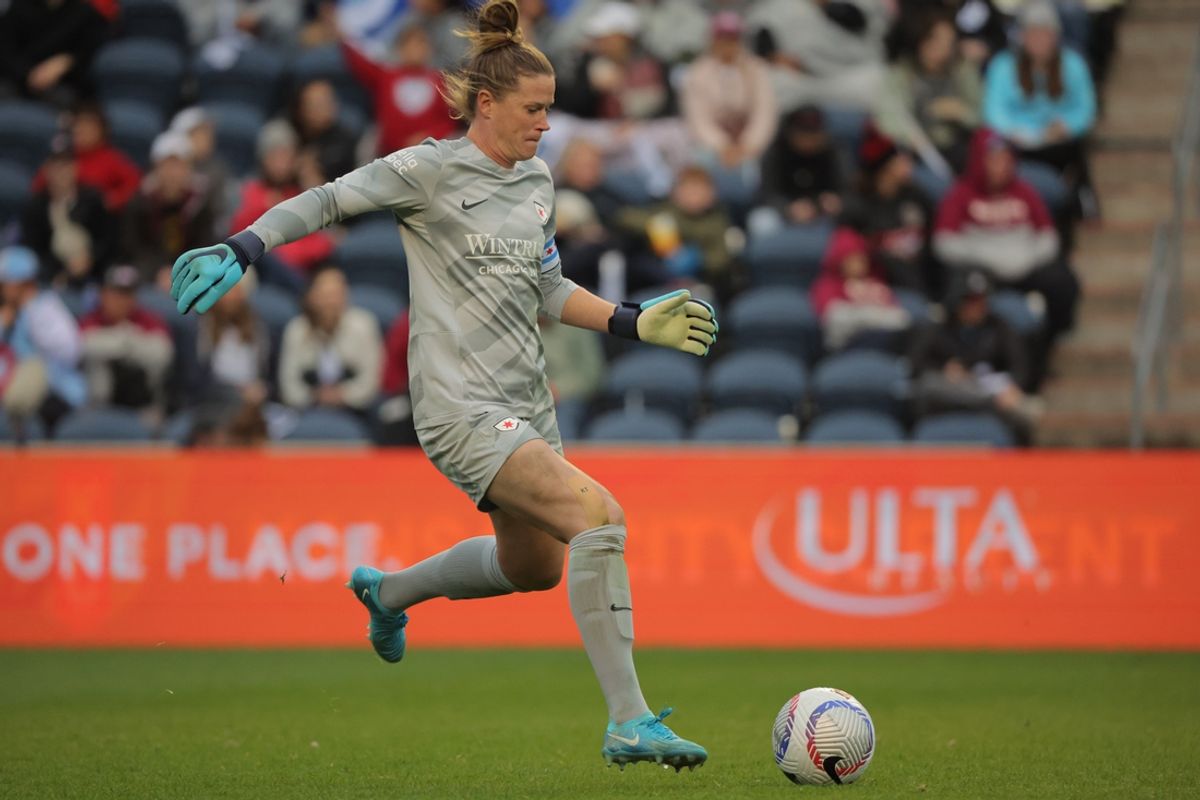 Nov 3, 2024; Bridgeview, Illinois, USA;  Chicago Red Stars goalkeeper Alyssa Naeher (1) plays the ball in the first half against the Kansas City Current at SeatGeek Stadium. Mandatory Credit: Melissa Tamez-Imagn Images