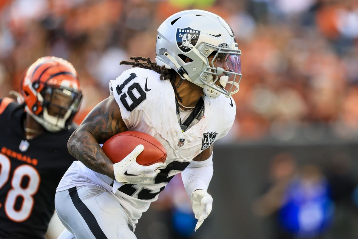 Nov 3, 2024; Cincinnati, Ohio, USA; Las Vegas Raiders wide receiver DJ Turner (19) runs with the ball against the Cincinnati Bengals in the second half at Paycor Stadium. Mandatory Credit: Katie Stratman-Imagn Images
