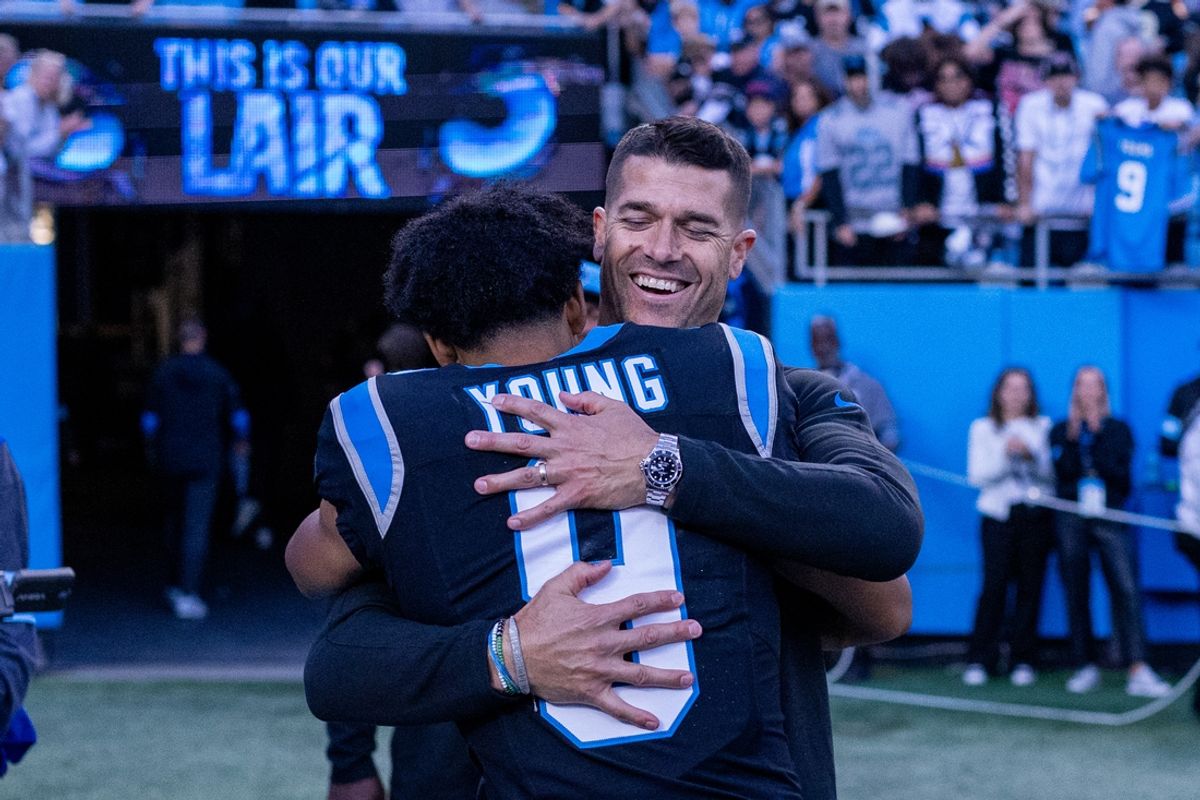 Nov 3, 2024; Charlotte, North Carolina, USA; Carolina Panthers head coach Dave Canales hugs quarterback Bryce Young (9) after getting the win against the New Orleans Saints at Bank of America Stadium. Mandatory Credit: Scott Kinser-Imagn Images