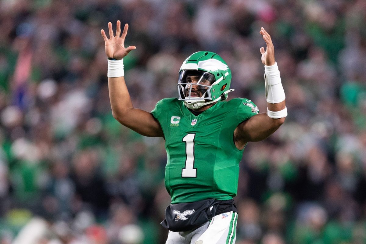 Nov 3, 2024; Philadelphia, Pennsylvania, USA; Philadelphia Eagles quarterback Jalen Hurts (1) reacts to Saquon Barkley (not pictured) touchdown run against the Jacksonville Jaguars during the second quarter at Lincoln Financial Field. Mandatory Credit: Bill Streicher-Imagn Images