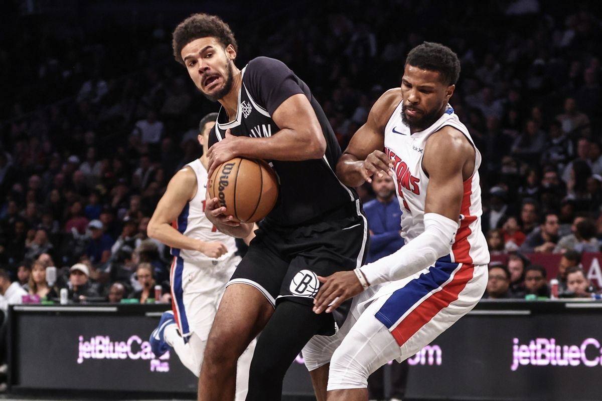 Nov 3, 2024; Brooklyn, New York, USA;  Brooklyn Nets forward Cameron Johnson (2) collides with Detroit Pistons guard Malik Beasley (5) in the fourth quarter at Barclays Center. Mandatory Credit: Wendell Cruz-Imagn Images