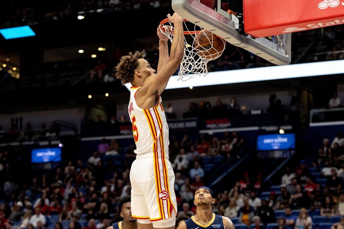 Nov 3, 2024; New Orleans, Louisiana, USA;  Atlanta Hawks guard Dyson Daniels (5) dunks the  ball against the New Orleans Pelicans during the first half at Smoothie King Center. Mandatory Credit: Stephen Lew-Imagn Images