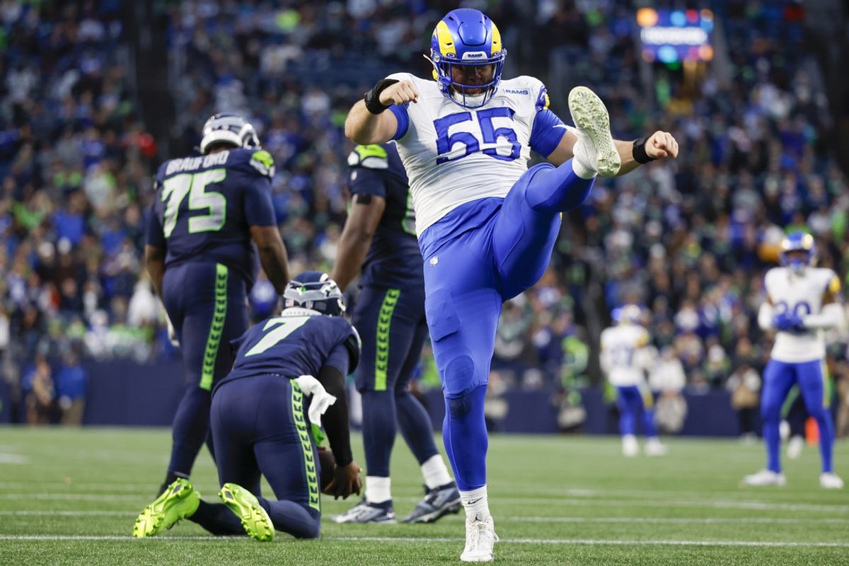 Nov 3, 2024; Seattle, Washington, USA; Los Angeles Rams defensive tackle Braden Fiske (55) celebrates following a sack against Seattle Seahawks quarterback Geno Smith (7) during the fourth quarter at Lumen Field. Mandatory Credit: Joe Nicholson-Imagn Images