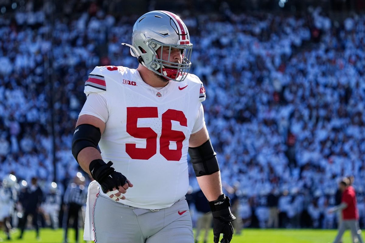Ohio State Buckeyes offensive lineman Seth McLaughlin (56) warms up during the NCAA football game against the Penn State Nittany Lions at Beaver Stadium in University Park, Pa. on Monday, Nov. 4, 2024. Ohio State won 20-13.
