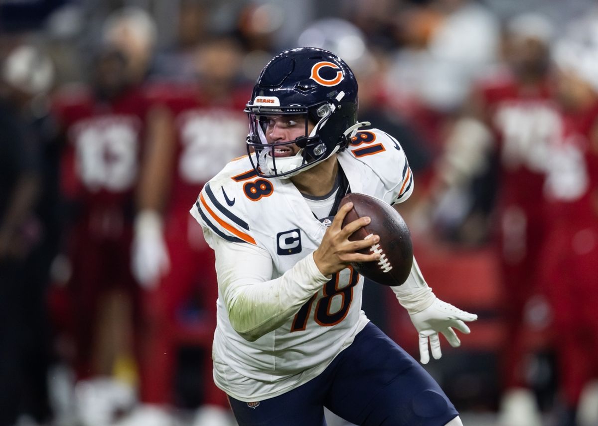 Nov 3, 2024; Glendale, Arizona, USA; Chicago Bears quarterback Caleb Williams (18) against the Arizona Cardinals at State Farm Stadium. Mandatory Credit: Mark J. Rebilas-Imagn Images