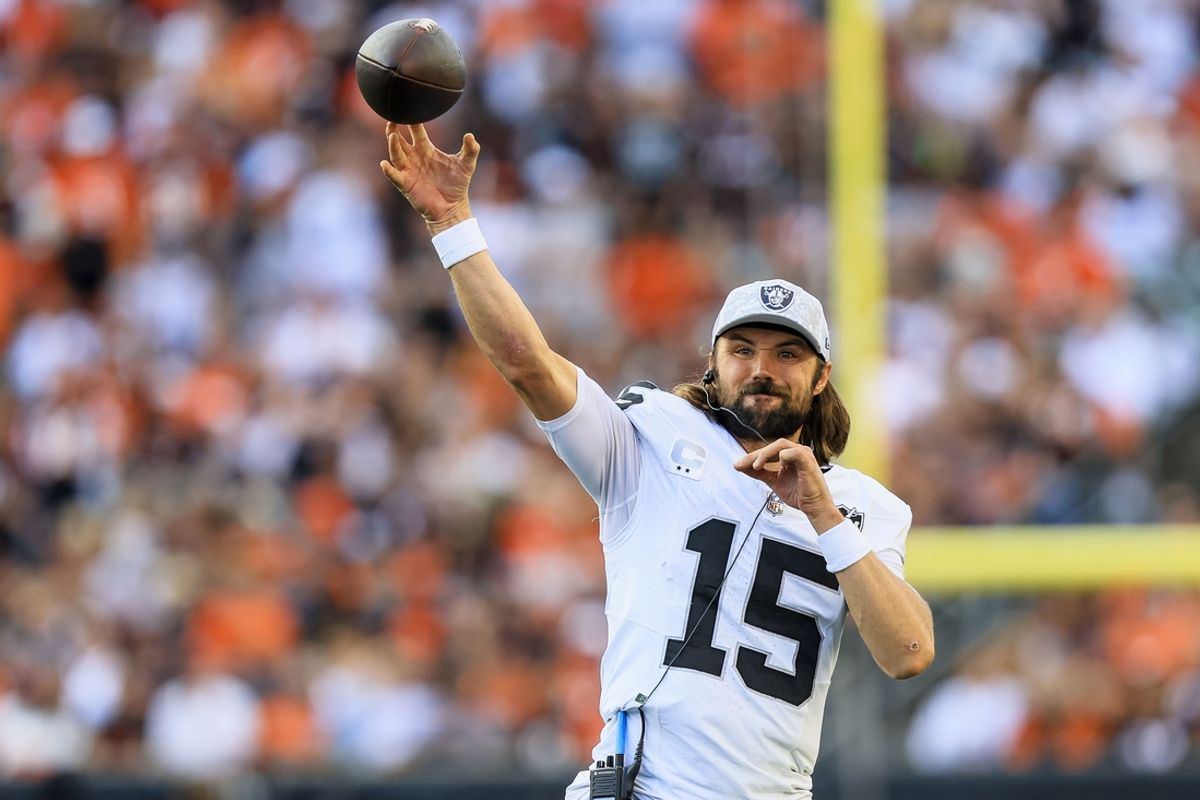 Nov 3, 2024; Cincinnati, Ohio, USA; Las Vegas Raiders quarterback Gardner Minshew (15) warms up on the sidelines during the second half against the Cincinnati Bengals at Paycor Stadium. Mandatory Credit: Katie Stratman-Imagn Images