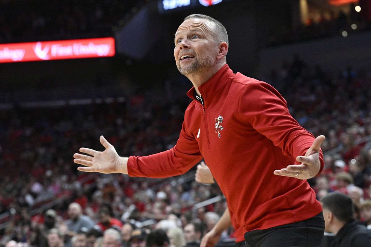 Nov 4, 2024; Louisville, Kentucky, USA;  Louisville Cardinals head coach Pat Kelsey reacts during the first half against the Morehead State Eagles at KFC Yum! Center. Mandatory Credit: Jamie Rhodes-Imagn Images