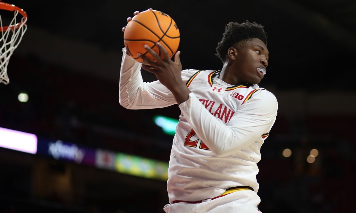 Nov 4, 2024; College Park, Maryland, USA; Maryland Terrapins center Derik Queen (25) grabs a rebound during the first half against the Manhattan Jaspers at Xfinity Center. Mandatory Credit: Daniel Kucin Jr.-Imagn Images
