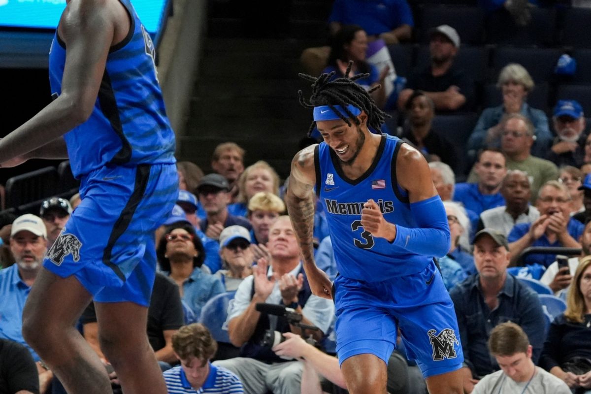 Memphis' Colby Rogers (3) smiles as he runs back on defense after making a 3-pointer during the game between the University of Memphis and Missouri at FedExForum in Memphis, Tenn., on Monday, November 4, 2024.
