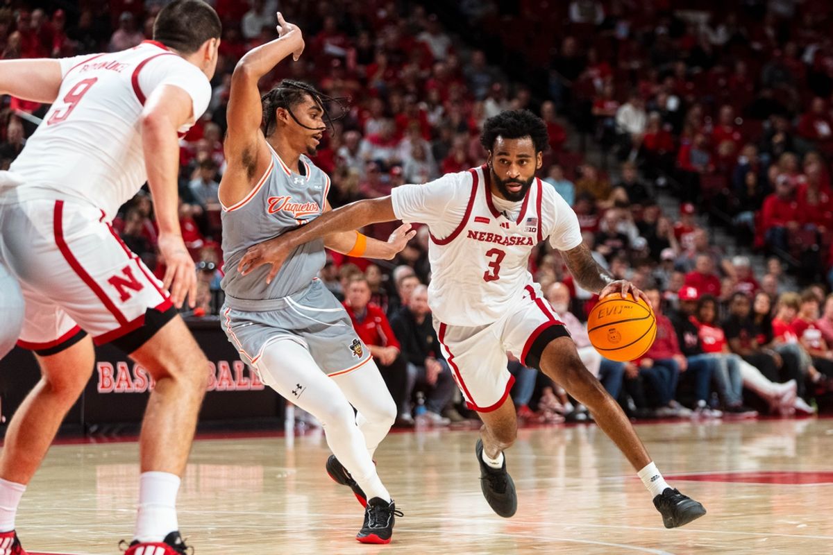 Nov 4, 2024; Lincoln, Nebraska, USA; Nebraska Cornhuskers guard Brice Williams (3) drives against UT Rio Grande Valley Vaqueros guard Howie Fleming Jr. (5) during the first half at Pinnacle Bank Arena. Mandatory Credit: Dylan Widger-Imagn Images