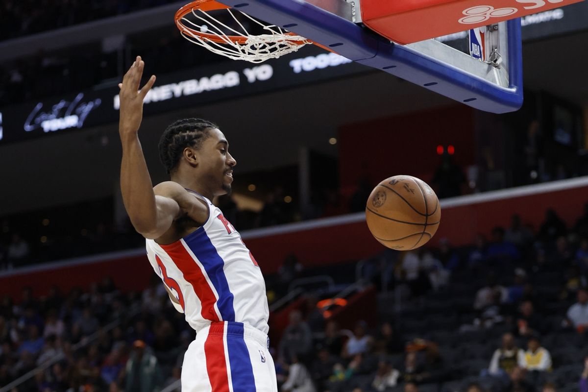 Nov 4, 2024; Detroit, Michigan, USA;  Detroit Pistons guard Jaden Ivey (23) dunks in the second half against the Los Angeles Lakers at Little Caesars Arena. Mandatory Credit: Rick Osentoski-Imagn Images