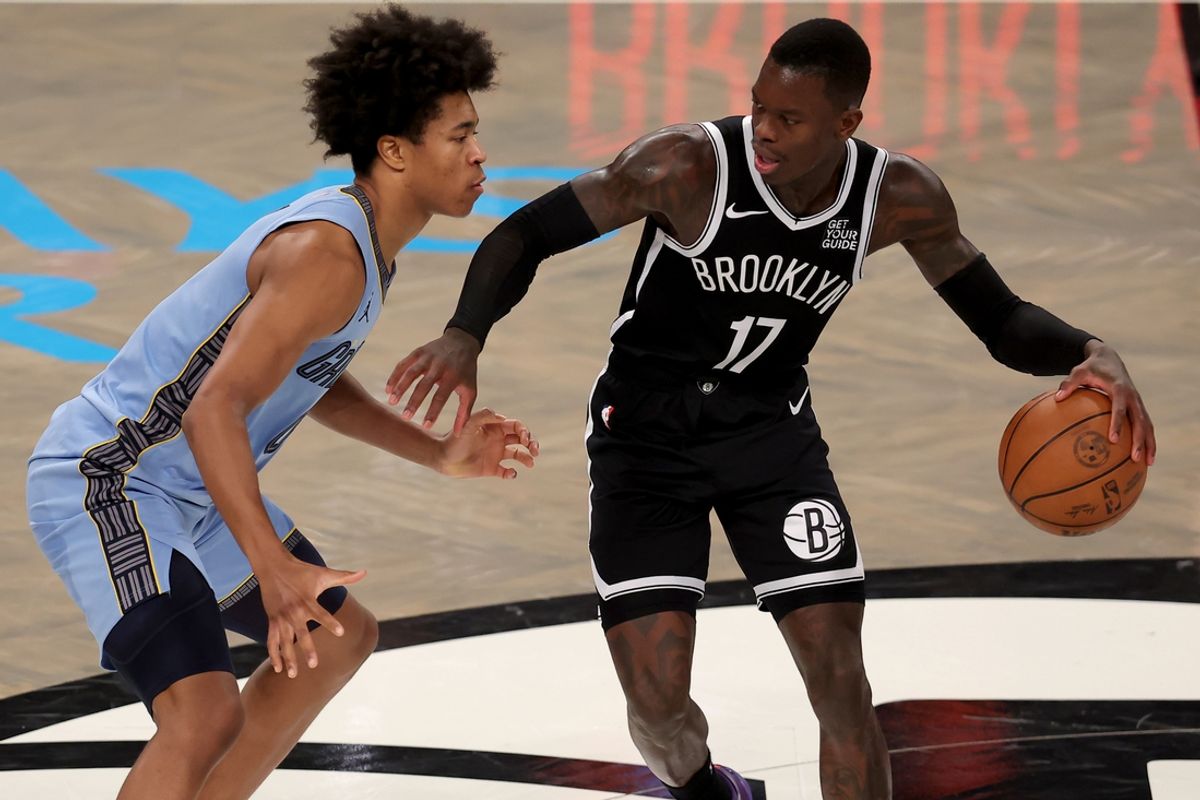 Nov 4, 2024; Brooklyn, New York, USA; Brooklyn Nets guard Dennis Schroder (17) controls the ball against Memphis Grizzlies forward Jaylen Wells (0) during the fourth quarter at Barclays Center. Mandatory Credit: Brad Penner-Imagn Images