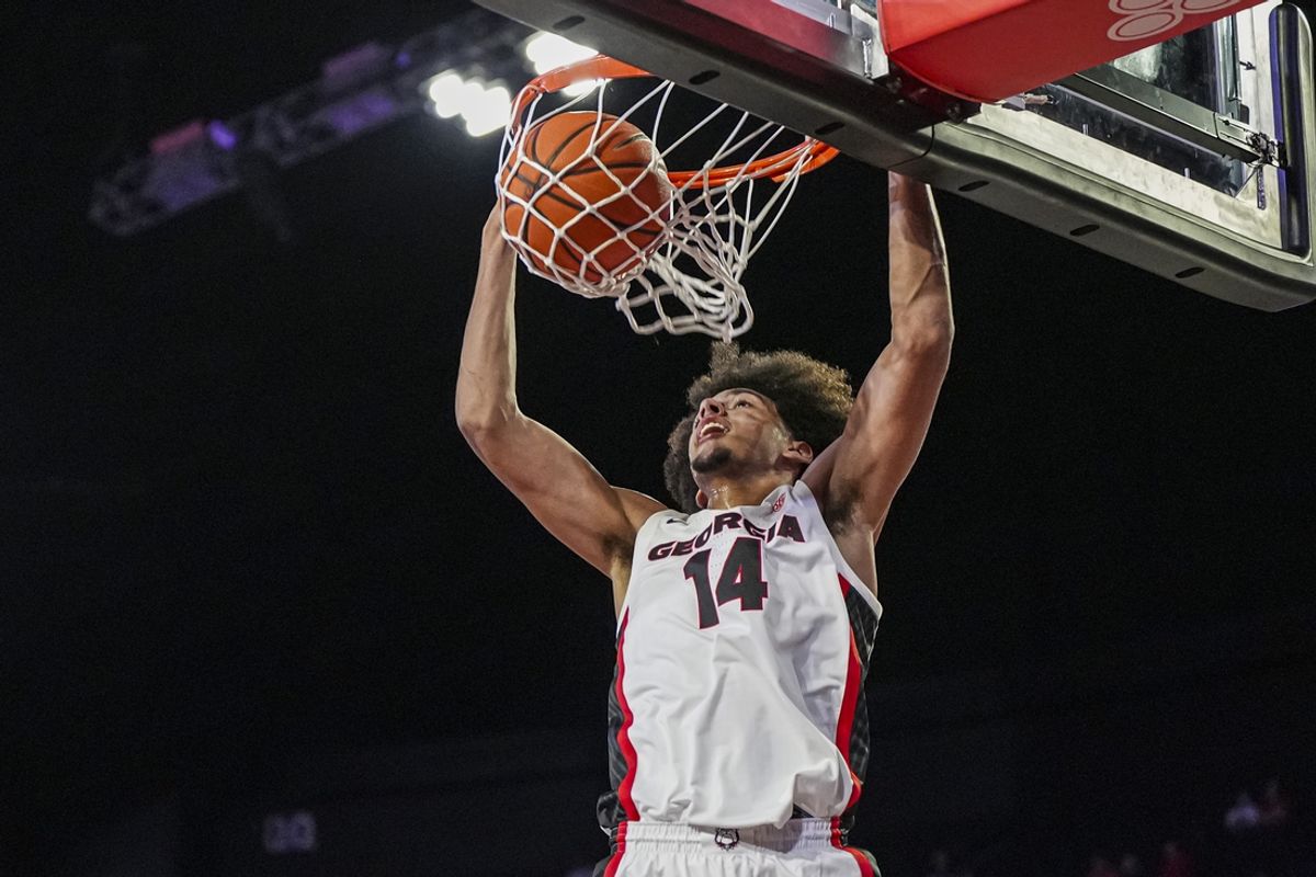 Nov 4, 2024; Athens, Georgia, USA; Georgia Bulldogs forward Asa Newell (14) dunks against the Tennessee Tech Golden Eagles at Stegeman Coliseum. Mandatory Credit: Dale Zanine-Imagn Images