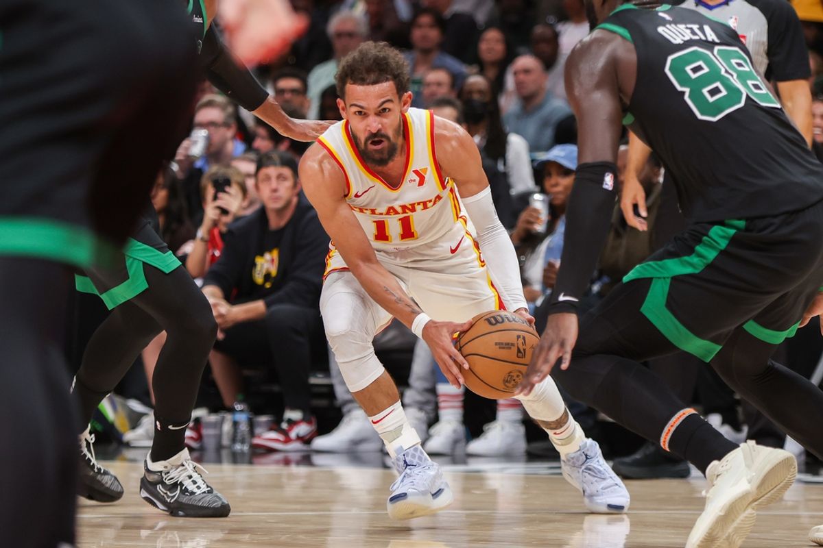Nov 4, 2024; Atlanta, Georgia, USA; Atlanta Hawks guard Trae Young (11) drives to the basket against the Boston Celtics in the third quarter at State Farm Arena. Mandatory Credit: Brett Davis-Imagn Images