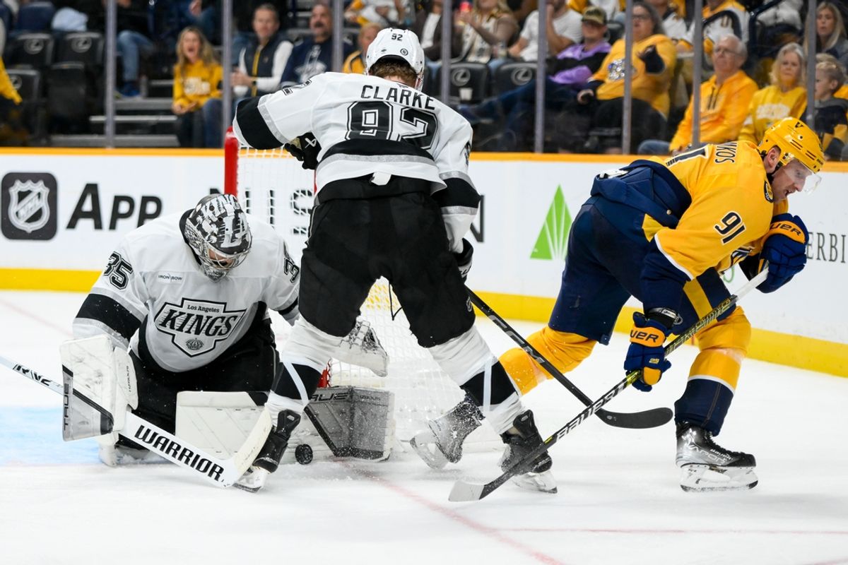 Nov 4, 2024; Nashville, Tennessee, USA;  Los Angeles Kings goaltender Darcy Kuemper (35) blocks the shot of Nashville Predators center Steven Stamkos (91) during the third period at Bridgestone Arena. Mandatory Credit: Steve Roberts-Imagn Images