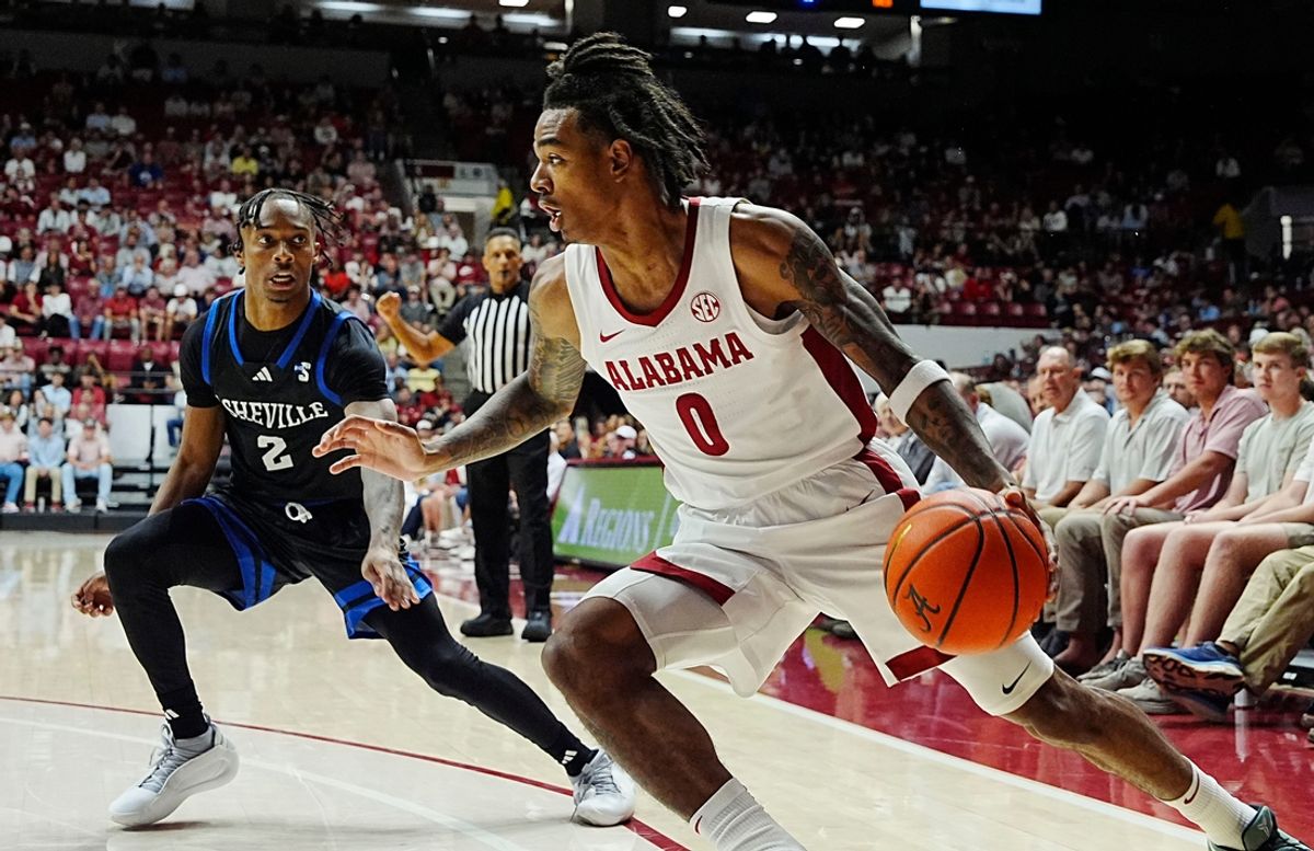 Nov 4, 2024; Tuscaloosa, Alabama, USA; UNC Asheville guard Jordan Marsh (2) guards Alabama guard Labaron Philon (0) at Coleman Coliseum.