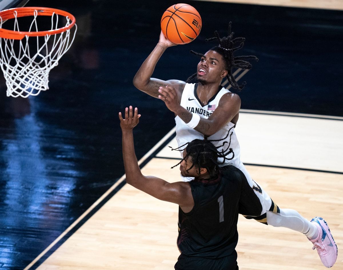 Vanderbilt Commodores guard Jason Edwards (1) is fouled by Maryland-Eastern Shore Hawks guard Ralph Martino Jr. (1) on the shot during their game at Memorial Gym in Nashville, Tenn., Monday, Nov. 4, 2024.