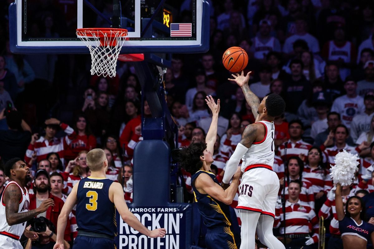 Nov 4, 2024; Tucson, Arizona, USA; Arizona Wildcats guard Caleb Love (1) makes a layup against the Canisius Golden Griffins during the first half at McKale Center. Mandatory Credit: Aryanna Frank-Imagn Images