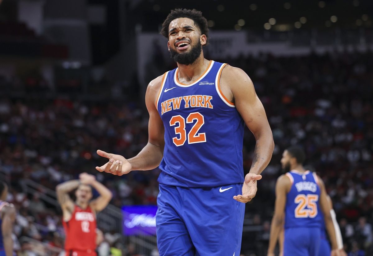 Nov 4, 2024; Houston, Texas, USA; New York Knicks center Karl-Anthony Towns (32) reacts after a play during the second half against the Houston Rockets at Toyota Center. Mandatory Credit: Troy Taormina-Imagn Images