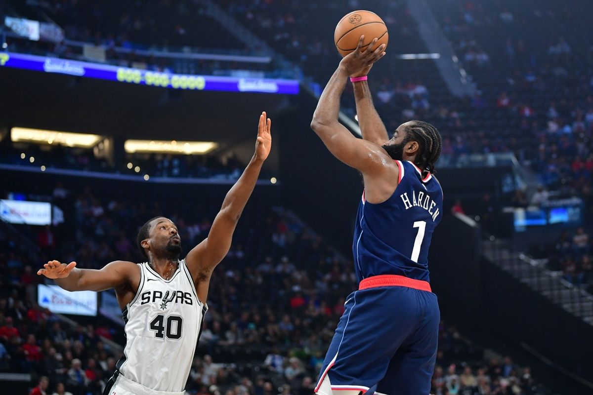 Nov 4, 2024; Inglewood, California, USA; Los Angeles Clippers guard James Harden (1) shoots against San Antonio Spurs forward Harrison Barnes (40) during the first half at Intuit Dome. Mandatory Credit: Gary A. Vasquez-Imagn Images